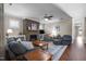 Inviting living room with a stone fireplace, hardwood floors, and open layout at 5733 Mizuno Dr, Fuquay Varina, NC 27526