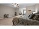 Main bedroom featuring sitting area with natural light and a ceiling fan at 5733 Mizuno Dr, Fuquay Varina, NC 27526