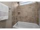 Close up of tiled shower with built-in shelf and window at 5733 Mizuno Dr, Fuquay Varina, NC 27526
