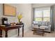 Sitting area featuring a loveseat and wooden table at 5733 Mizuno Dr, Fuquay Varina, NC 27526