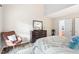 Bedroom featuring dresser with mirror and stylish decor at 5911 Mountain Island Dr, Durham, NC 27713