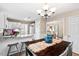 Bright dining area connected to the kitchen, featuring a table with seating, providing a great space to dine at 5911 Mountain Island Dr, Durham, NC 27713