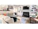 Cozy living room boasting a fireplace, built-in shelving, and comfortable seating for relaxing and entertaining at 5911 Mountain Island Dr, Durham, NC 27713