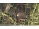 Beautiful aerial view of the property with a red perimeter, surrounded by lush greenery and neighboring houses at 605 Faucette Mill Rd, Hillsborough, NC 27278