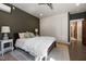 Cozy bedroom featuring a built-in wardrobe for ample storage and a comfortable sleeping space at 605 Faucette Mill Rd, Hillsborough, NC 27278