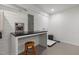 Functional dog room features a counter, storage, and a pet bed at 605 Faucette Mill Rd, Hillsborough, NC 27278