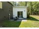 Modern building with outdoor patio and lawn at 605 Faucette Mill Rd, Hillsborough, NC 27278