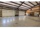 Large garage offering plenty of space, multiple doors, and storage options at 605 Faucette Mill Rd, Hillsborough, NC 27278