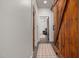 Hallway features a unique barn door, offering a stylish transition between spaces at 605 Faucette Mill Rd, Hillsborough, NC 27278