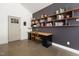 Functional home office with built-in shelving and desk provides ample space for work or study at 605 Faucette Mill Rd, Hillsborough, NC 27278
