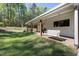 A welcoming porch with a wooden porch swing at 605 Faucette Mill Rd, Hillsborough, NC 27278