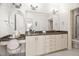 Bathroom featuring double sinks, granite countertops, and vanity at 608 Derby Ct, Durham, NC 27707