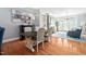 Elegant dining room with hardwood floors, stylish furnishings, and ample natural light at 608 Derby Ct, Durham, NC 27707