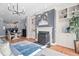 Open-concept living room flows into the dining area, creating a seamless living space at 608 Derby Ct, Durham, NC 27707