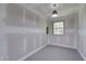Unfinished basement with exposed walls and gray concrete flooring at 6105 Bellow St, Raleigh, NC 27609