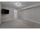 Neutral bedroom with carpet, closet access, and a ceiling light at 6105 Bellow St, Raleigh, NC 27609
