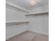 Walk-in closet with carpet and multiple clothes racks at 6105 Bellow St, Raleigh, NC 27609