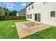 Spacious backyard featuring a well-maintained lawn and a concrete patio, perfect for outdoor entertaining at 617 Conover Rd, Durham, NC 27703