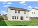 A large backyard with a patio at 617 Conover Rd, Durham, NC 27703