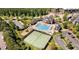 Beautiful aerial view of community pool, tennis court, playground and neighborhood common areas at 633 Democracy St, Raleigh, NC 27603