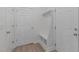 Bright mudroom features a built-in bench with storage and hooks, perfect for organization at 633 Democracy St, Raleigh, NC 27603