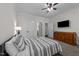 Bedroom featuring carpet floors, ceiling fan, and natural light at 64 Thousand Oaks Ct, Clayton, NC 27527