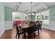 Elegant dining room with coffered ceilings, a wooden table, and abundant natural light at 64 Thousand Oaks Ct, Clayton, NC 27527