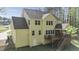 Back exterior view of the home featuring a deck and screened-in porch at 64 Thousand Oaks Ct, Clayton, NC 27527