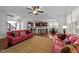 Open-concept living area with a kitchen, a dining area, and a comfortable living space at 64 Thousand Oaks Ct, Clayton, NC 27527