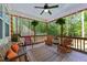 Relaxing screened porch with comfortable seating, perfect for enjoying the surrounding nature at 64 Thousand Oaks Ct, Clayton, NC 27527