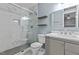 Beautifully renovated bathroom with a glass-enclosed shower and modern fixtures at 6568 English Oaks Dr, Raleigh, NC 27615