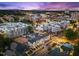 Charming residential and retail neighborhood at twilight, perfect for enjoying nearby city conveniences at 700 W North St # 101, Raleigh, NC 27603