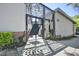 Building exterior with decorative metal entry and modern design at 701 W Trinity Ave # 116, Durham, NC 27701