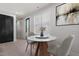 Cozy breakfast nook with a marble-top table, perfect for intimate meals at 730 Hopkins St, Durham, NC 27701