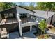 Eye-catching exterior showcasing two-story design, with a two-car garage and a spacious balcony at 730 Hopkins St, Durham, NC 27701