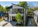 Contemporary two-story home with a two-car garage and modern architectural details at 730 Hopkins St, Durham, NC 27701