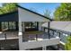 Modern two-story home showcasing a balcony and modern architectural elements at 730 Hopkins St, Durham, NC 27701