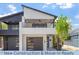 New construction home featuring a modern design with a front-facing balcony and spacious garages at 730 Hopkins St, Durham, NC 27701