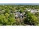 Aerial view of neighborhood with verdant trees, colorful houses, and a black house at 732 Hopkins St, Durham, NC 27701