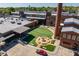 An aerial view of textile mill, featuring a courtyard with benches and manicured green space at 732 Hopkins St, Durham, NC 27701