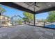 Expansive outdoor balcony features a geometric wood-tile floor and neighborhood views beneath a ceiling fan at 732 Hopkins St, Durham, NC 27701