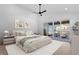 Main bedroom features neutral tones, ceiling fan and a sliding glass door leading to an outdoor patio at 732 Hopkins St, Durham, NC 27701