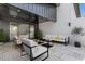 Inviting outdoor patio with modern furniture, offering a perfect spot for relaxation and entertainment at 732 Hopkins St, Durham, NC 27701