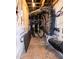 Unfinished basement space, showcasing black piping and wooden support beams, ready to be finished at 74 Revelstoke Dr, Garner, NC 27529