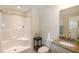 Clean and bright bathroom featuring a shower, toilet, and vanity at 74 Revelstoke Dr, Garner, NC 27529