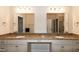 The bathroom showcases double sinks, granite countertops, and large mirrors at 74 Revelstoke Dr, Garner, NC 27529