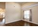 Bright bedroom with hardwood floors, natural light, and neutral paint at 74 Revelstoke Dr, Garner, NC 27529