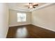 Spacious bedroom featuring trey ceiling, a ceiling fan, and a large window for plenty of natural light at 74 Revelstoke Dr, Garner, NC 27529