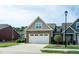 A well maintained home with a two car garage, landscaped yard and a long driveway for ample parking at 74 Revelstoke Dr, Garner, NC 27529