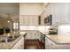 Gourmet kitchen with granite counters, stainless steel appliances, and ample storage space at 74 Revelstoke Dr, Garner, NC 27529